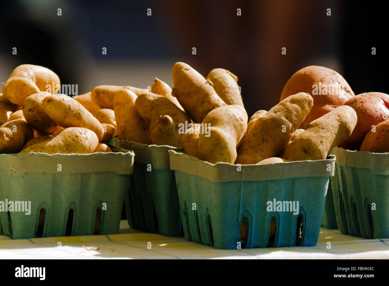 Potatoes for sale a farmers market Stock Photo