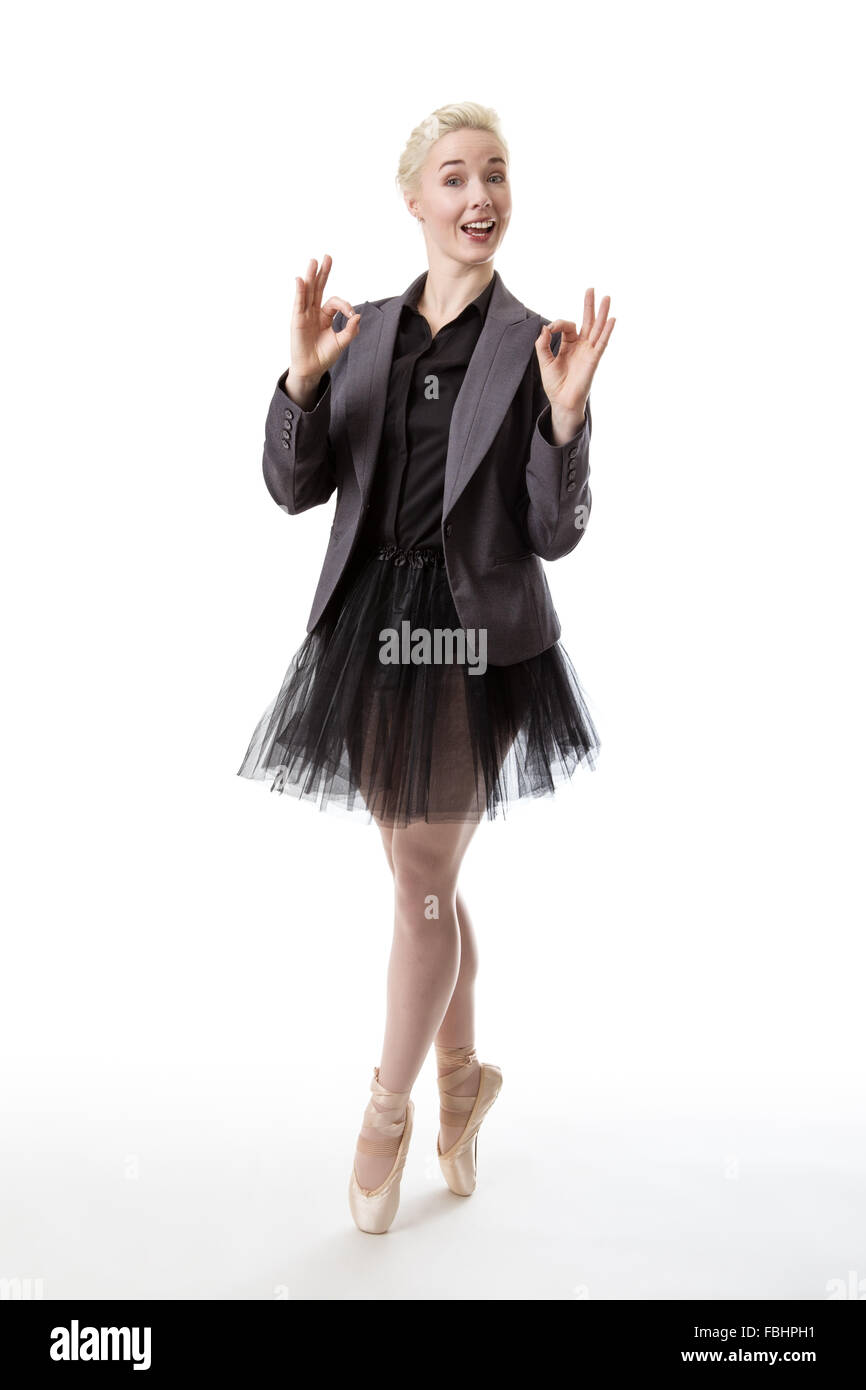 Model in a ballerina tutu, making the ok hand gesture with both hands Stock Photo