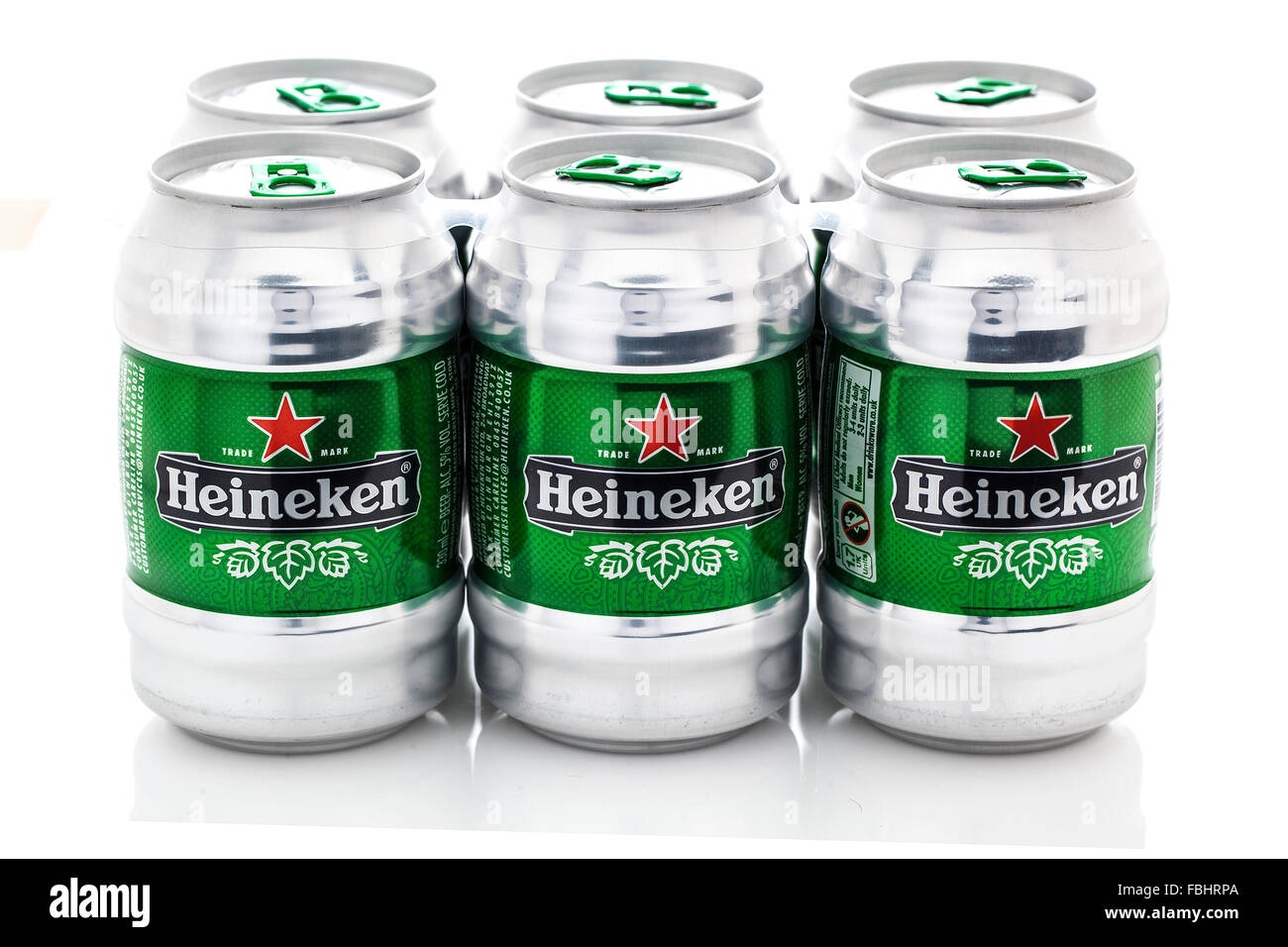 6 Cans of Heineken Beer on a white background Stock Photo
