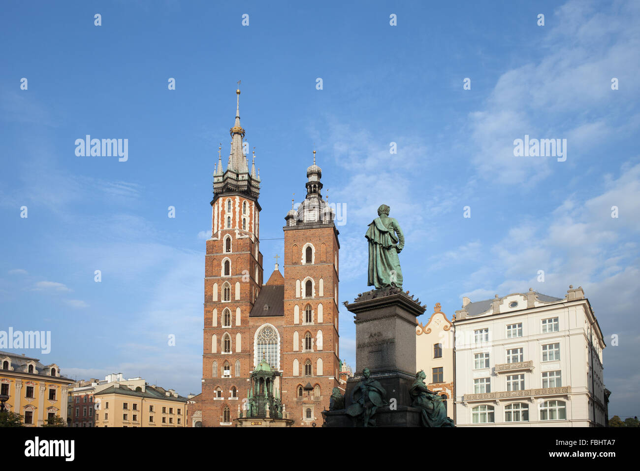 City of Krakow in Poland, Old Town skyline, St. Mary’s Basilica and Adam Mickiewicz monument Stock Photo