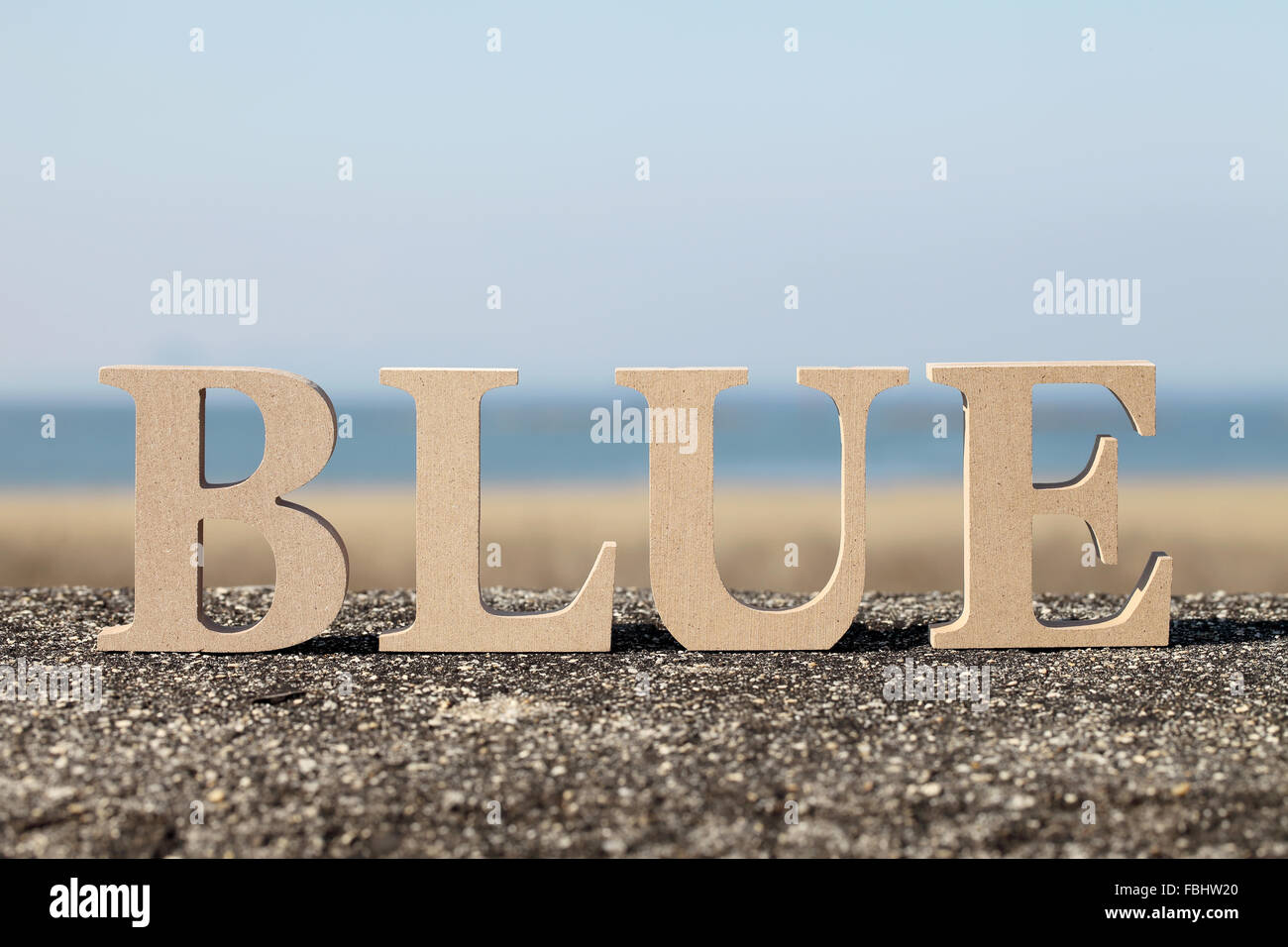 Word blue made with wooden block wooden letters Stock Photo