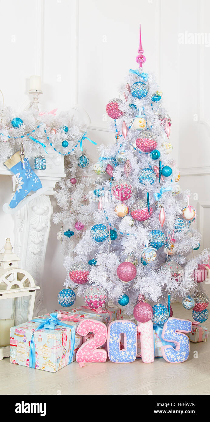 White fir-tree with pink and blue Christmas toys Stock Photo - Alamy