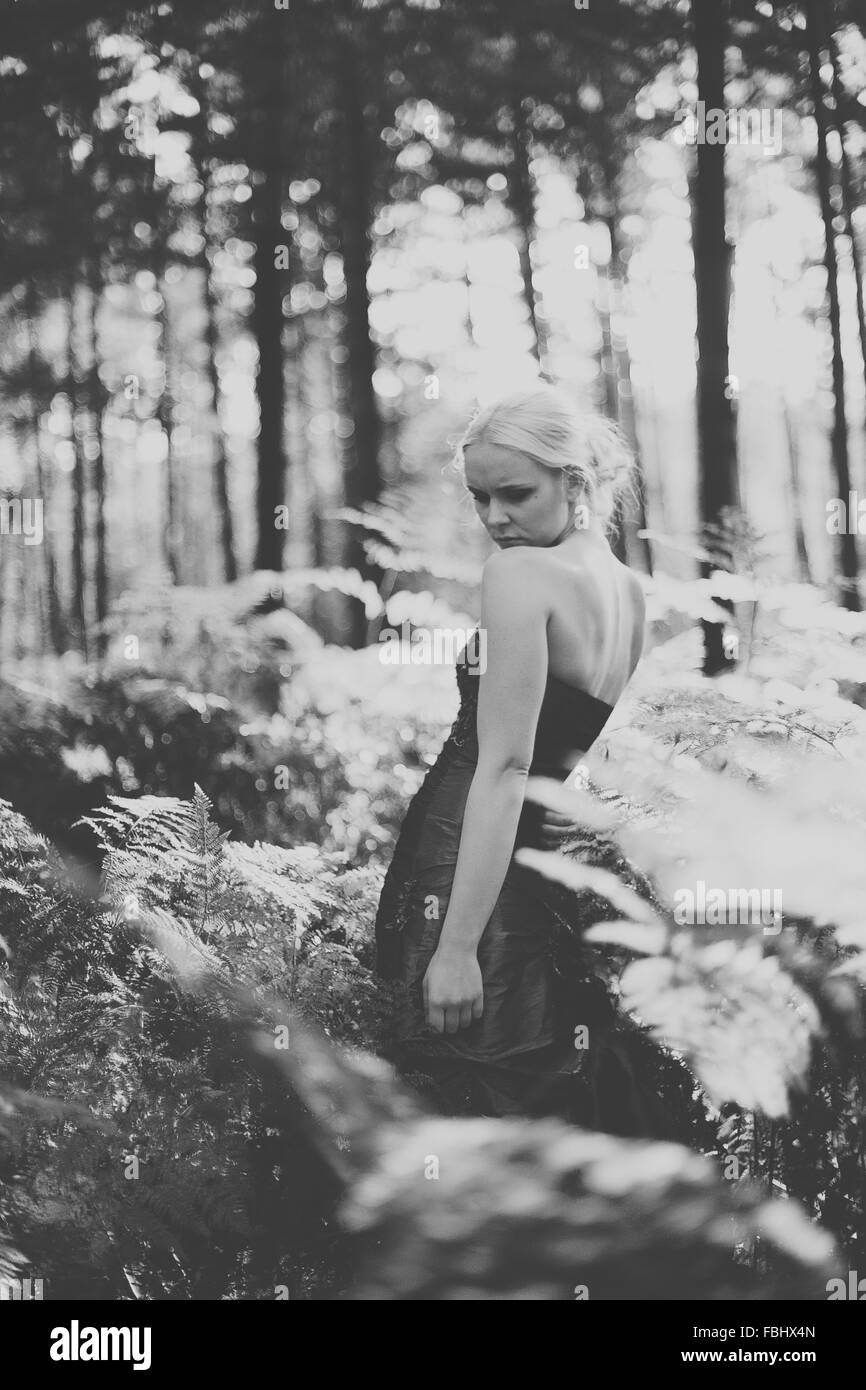 young woman with dress in forest Stock Photo - Alamy
