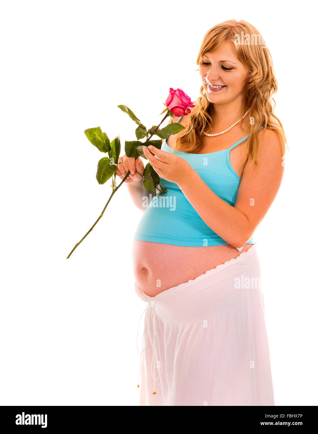 Pregnant woman with flower Stock Photo Alamy