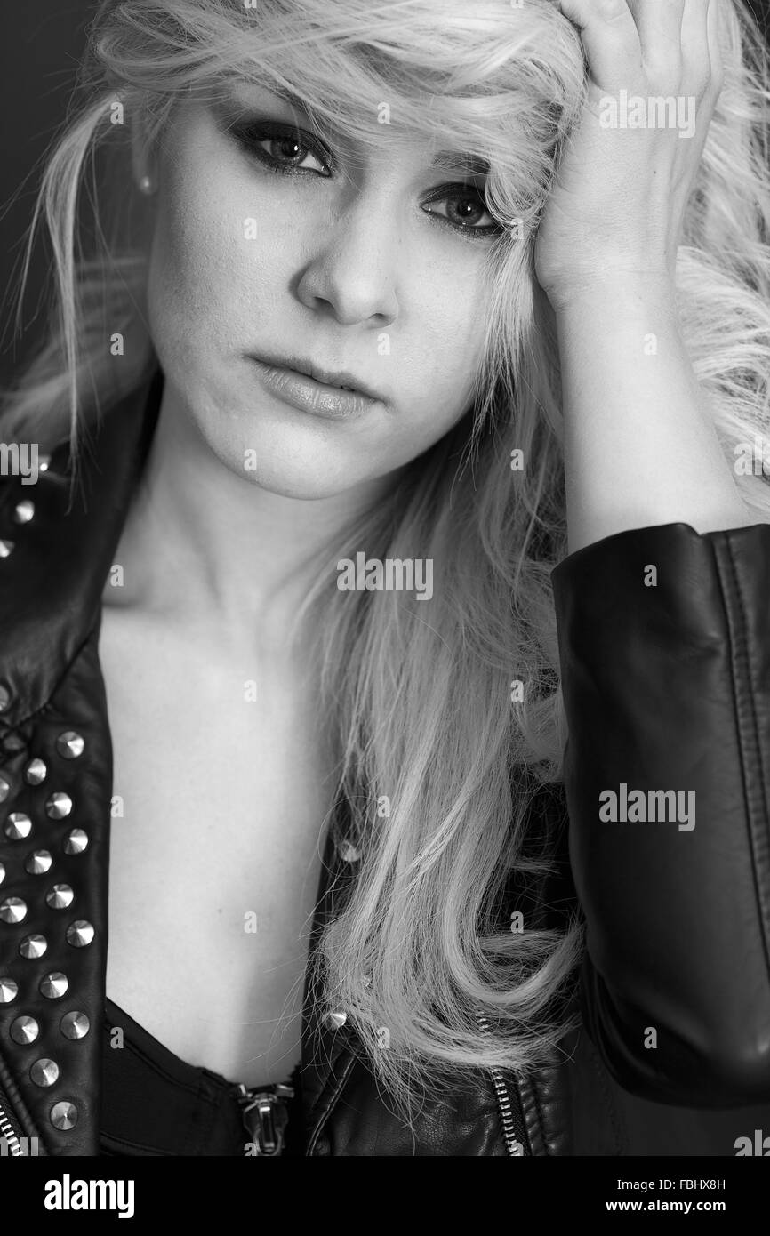 rocking portrait of a young woman Stock Photo - Alamy