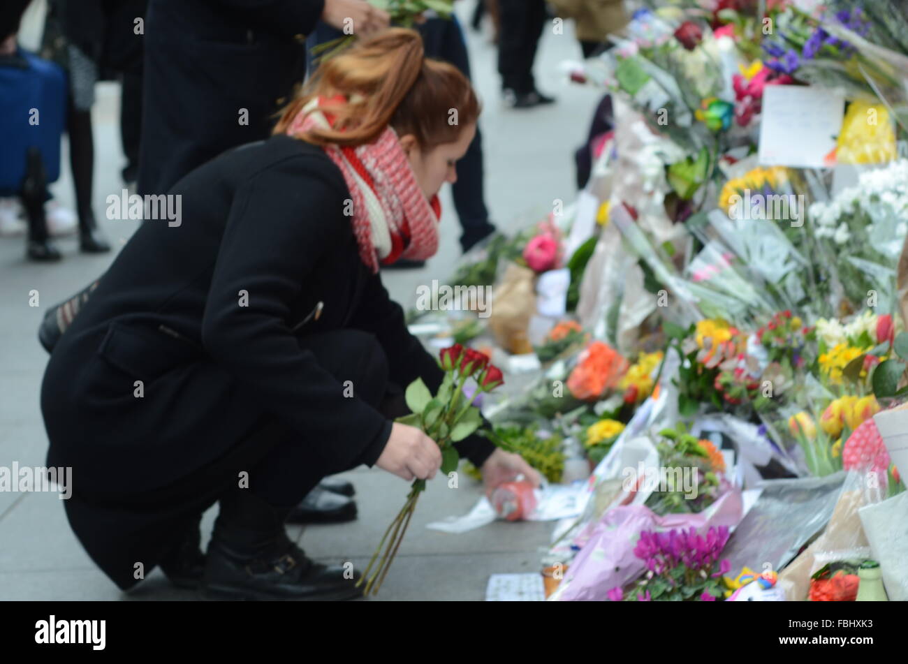 floral tributes laid before the David bowie mural, Stock Photo