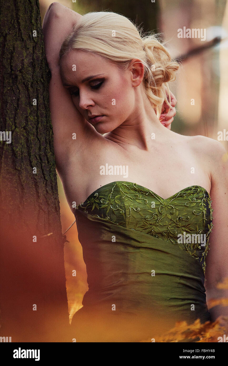 young woman with dress in forest Stock Photo - Alamy