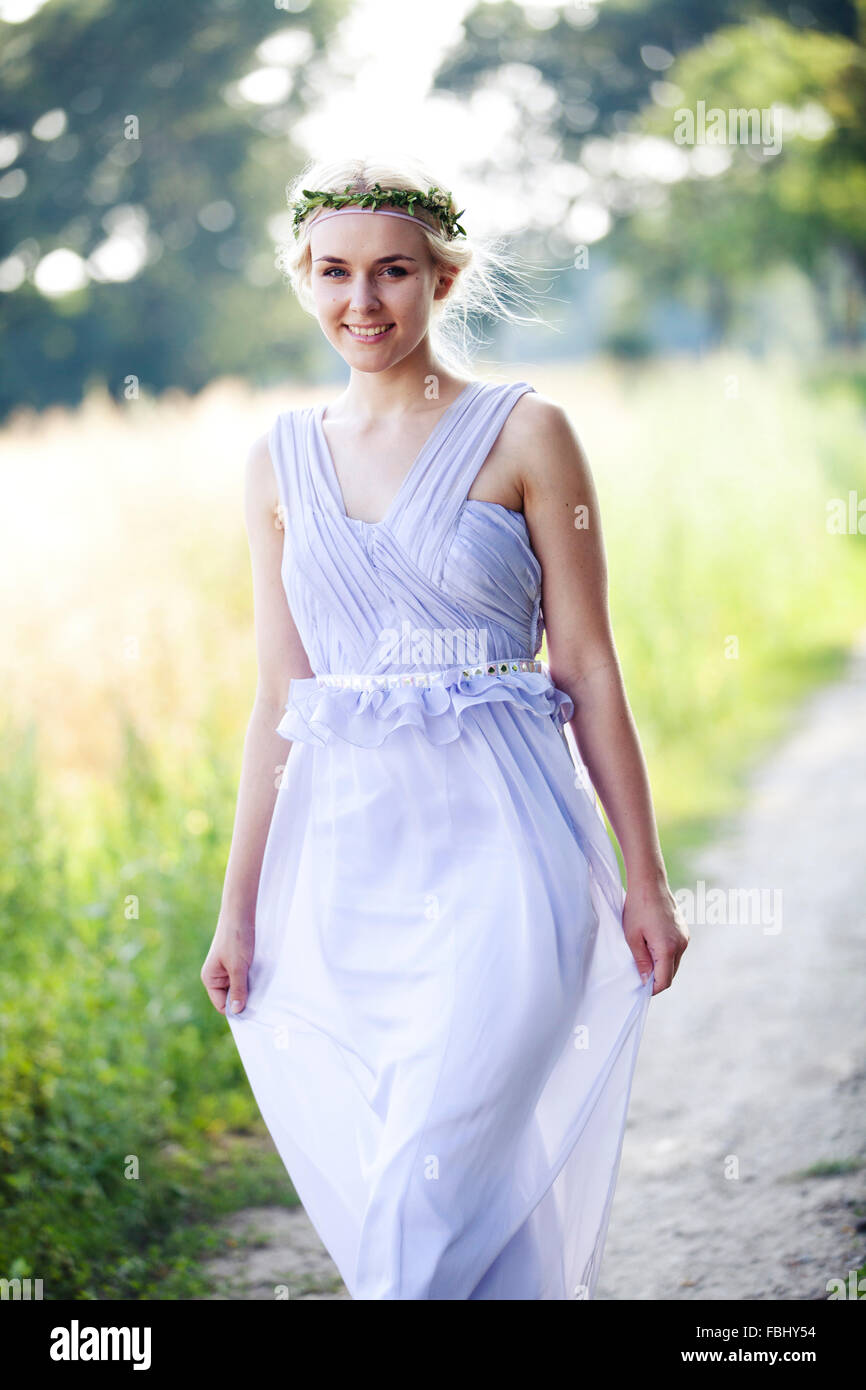 Young Woman Dancing In Summer Dress In Nature Stock Photo Alamy young-woman-dancing-in-summer-dress-in-nature-stock-photo-alamy