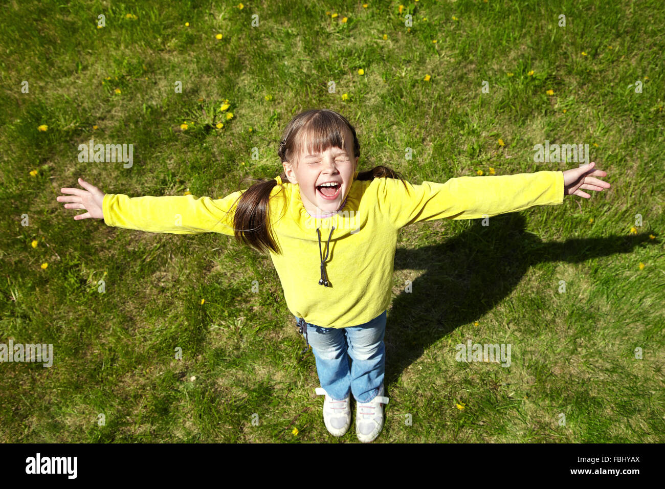 happy little girl in the park Stock Photo - Alamy