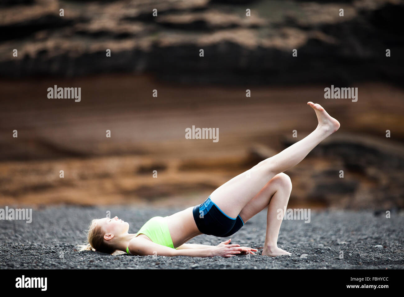 young woman doing yoga and Pilates - exercise 'arch' Stock Photo