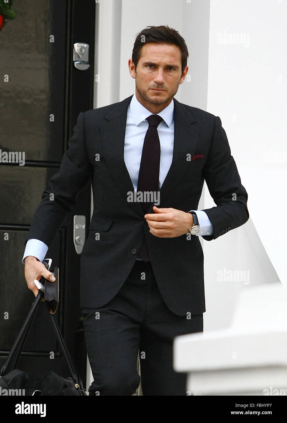 Frank Lampard leaving home, wearing a smart suit and tie. Featuring: Frank  Lampard Where: London, United Kingdom When: 17 Dec 2015 Stock Photo - Alamy