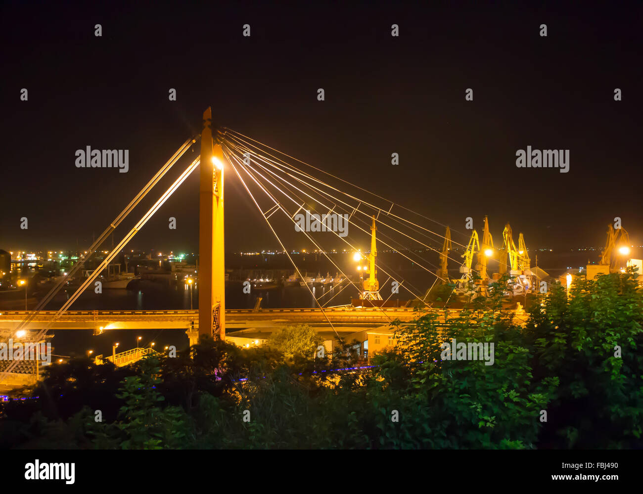 Night bridge in the port of Odessa. Ukraine. Summer. Stock Photo