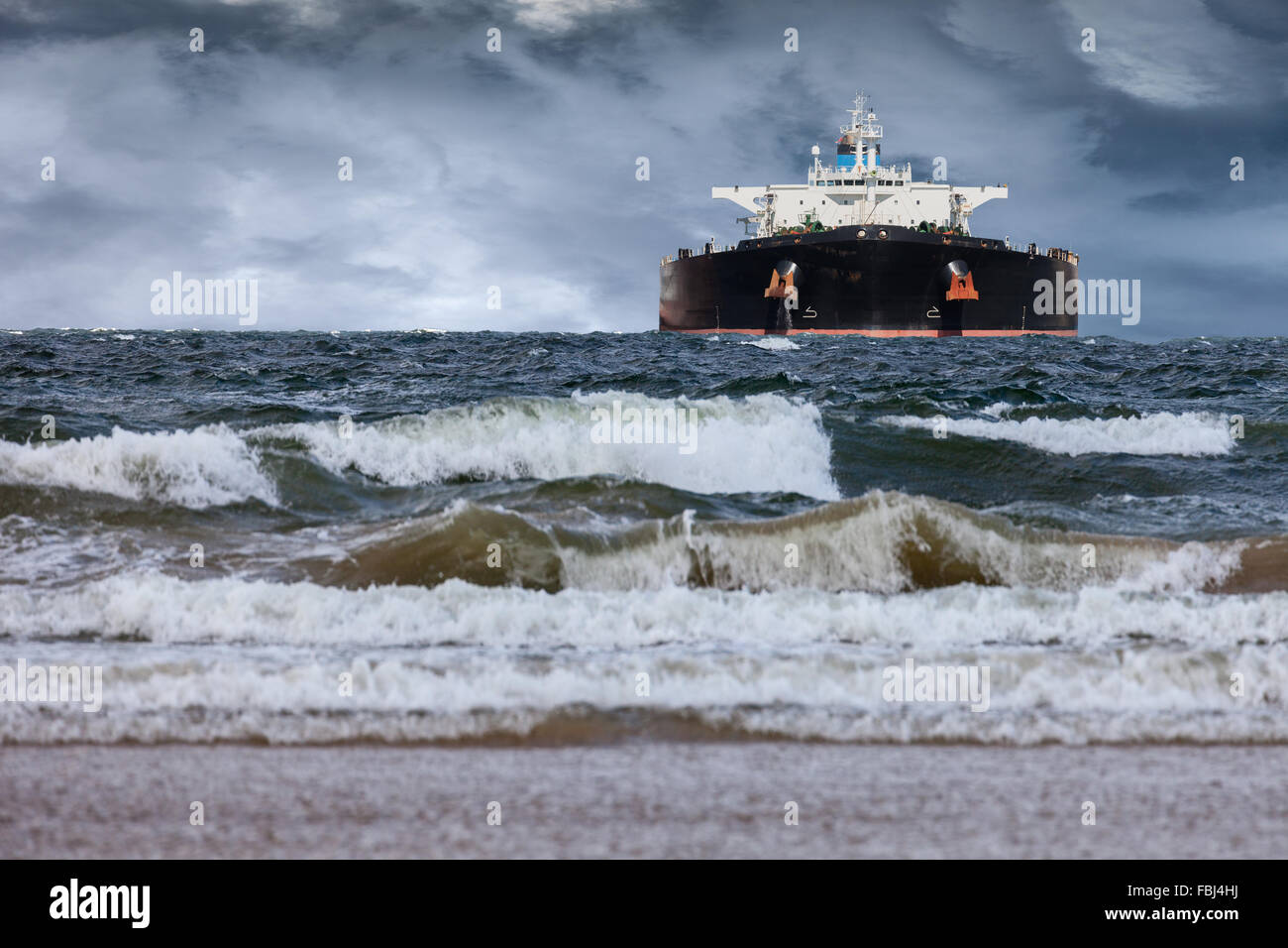 Tanker ship at sea during a storm Stock Photo Alamy