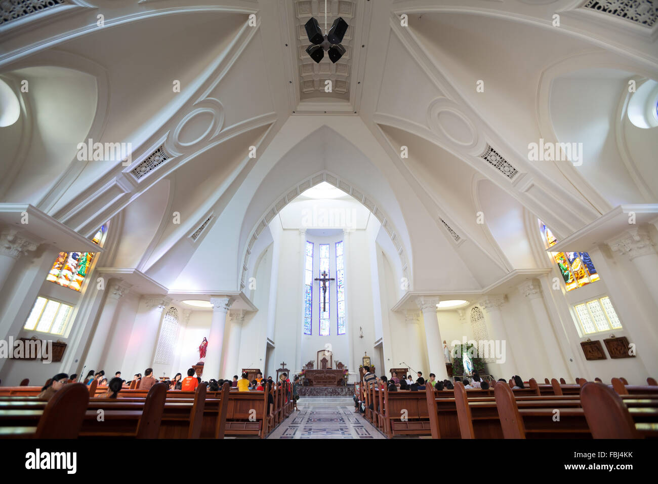 Congregation inside the Cathedral Church of Manado, North Sulawesi, Indonesia. Stock Photo