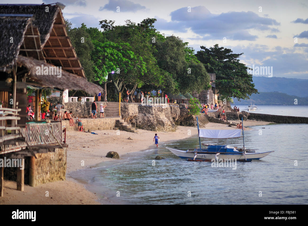 Early evening in Panagsama Beach Resort Moalboal Cebu Province Philippines Stock Photo