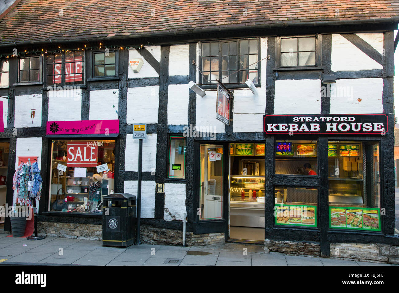 A historic Tudor building being used as a shop and Kebab House, Stratford upon Avon, Warwickshire, England, UK Stock Photo