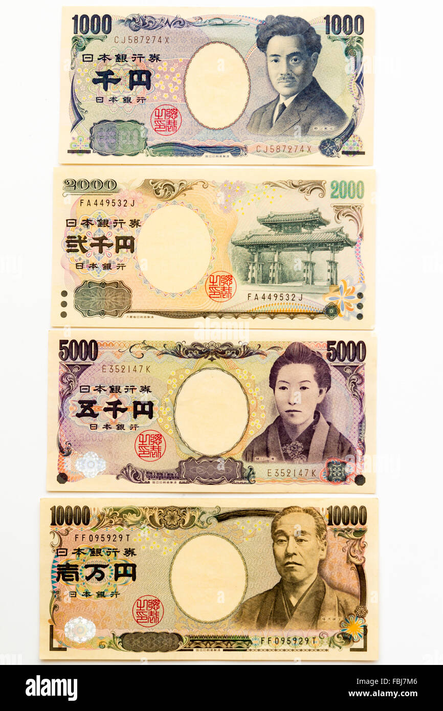 Money, currency. Set of the four Japanese banknotes currently in use, 10,000, 5000, 2000 and 1000 Yen notes. Face up. Stock Photo