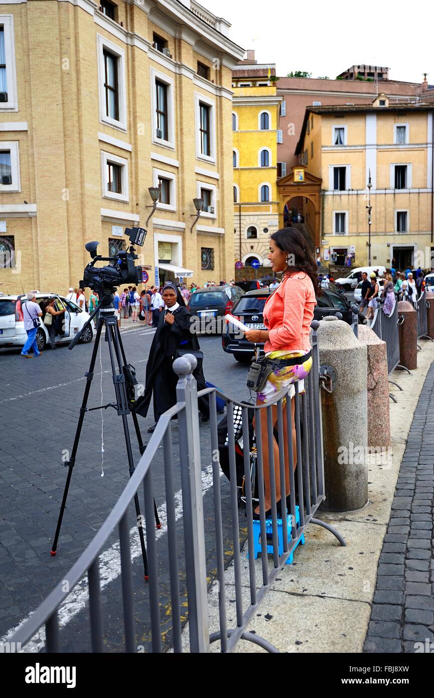 News reporter at the Vatican City Stock Photo - Alamy