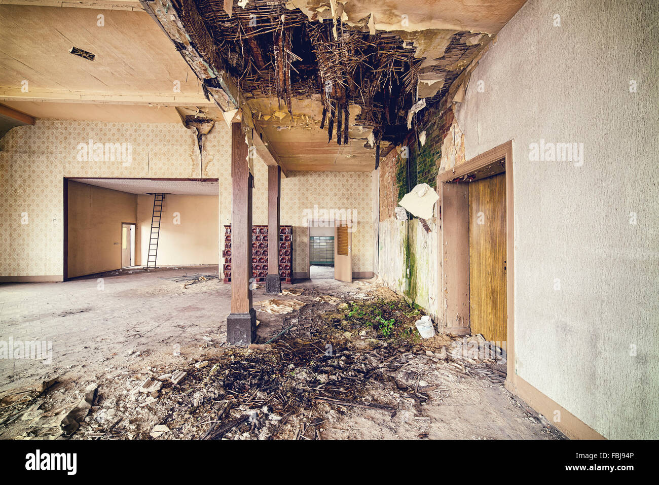 Decayed ballroom with collapsed ceiling Stock Photo