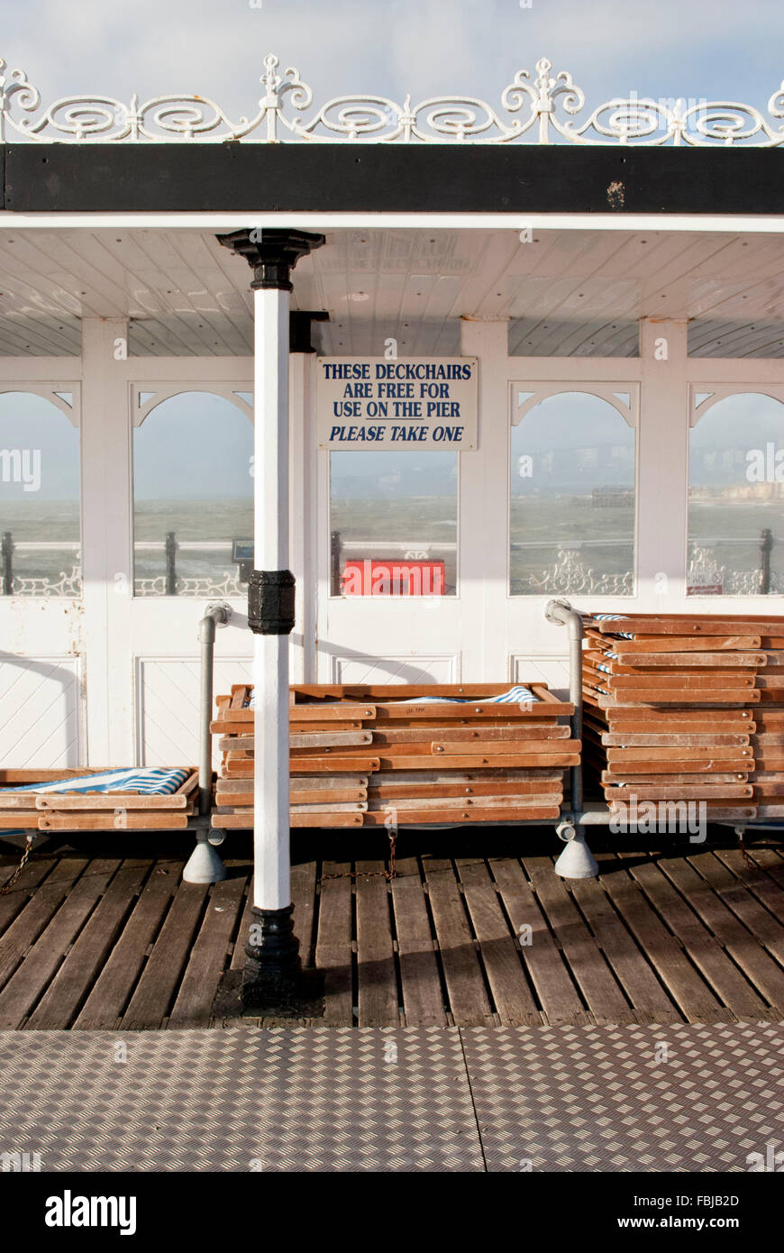 Brighton pier beach deck chairs hi-res stock photography and images - Alamy