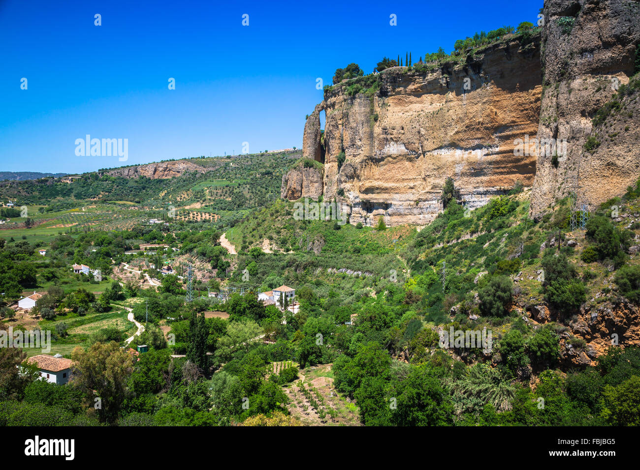 view of buildings over cliff in ronda, spain Stock Photo