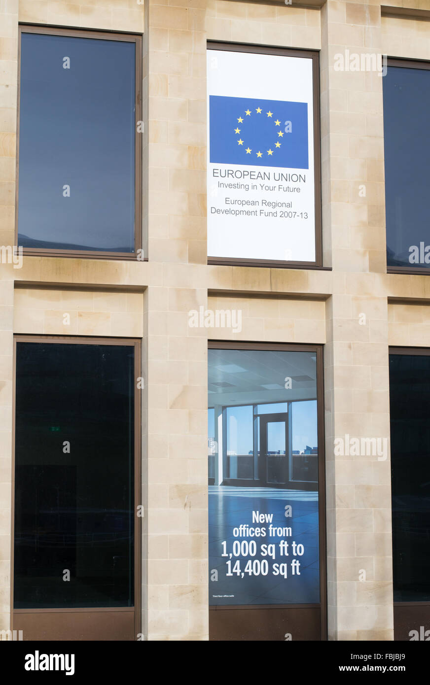 A notice on an office building constructed with the aid of the European Regional Development Fund, north east England, UK Stock Photo