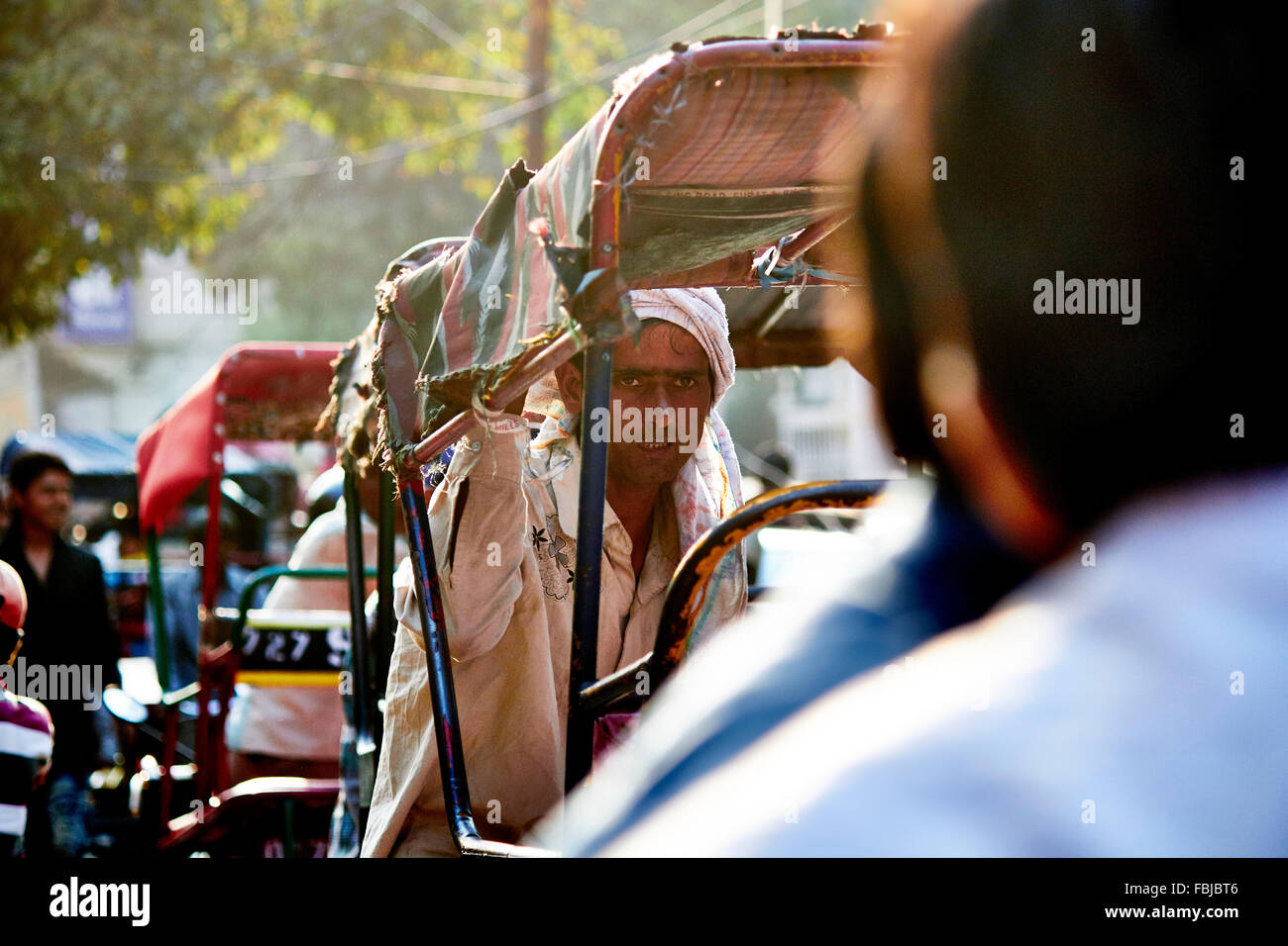 Rickshaw driver, streets Delhi, India, everyday situation Stock Photo
