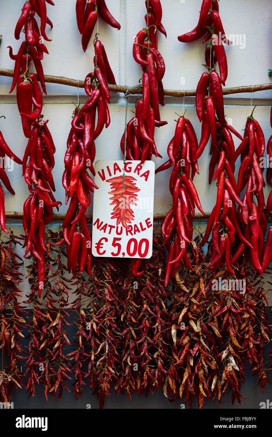 red chilli, hanging on branches, in the sun, Viagra naturale, Amalfi Coast, Italy, Europe Stock Photo