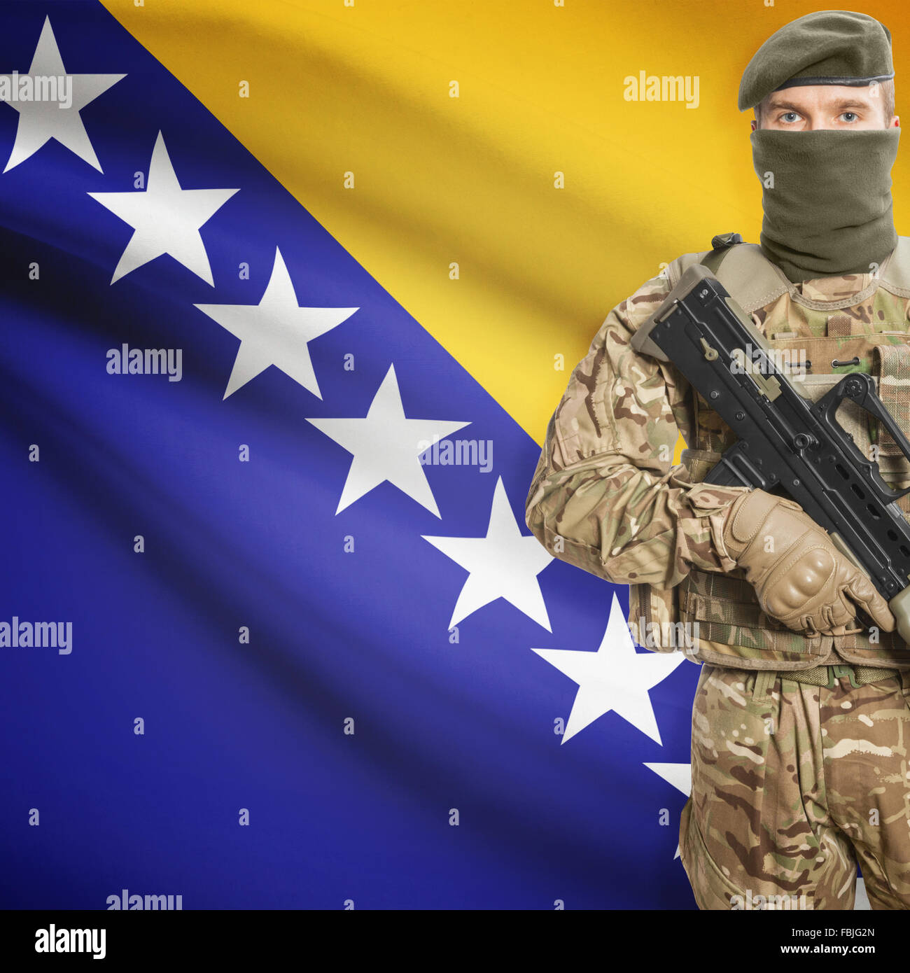 Soldier with machine gun and national flag on background series
