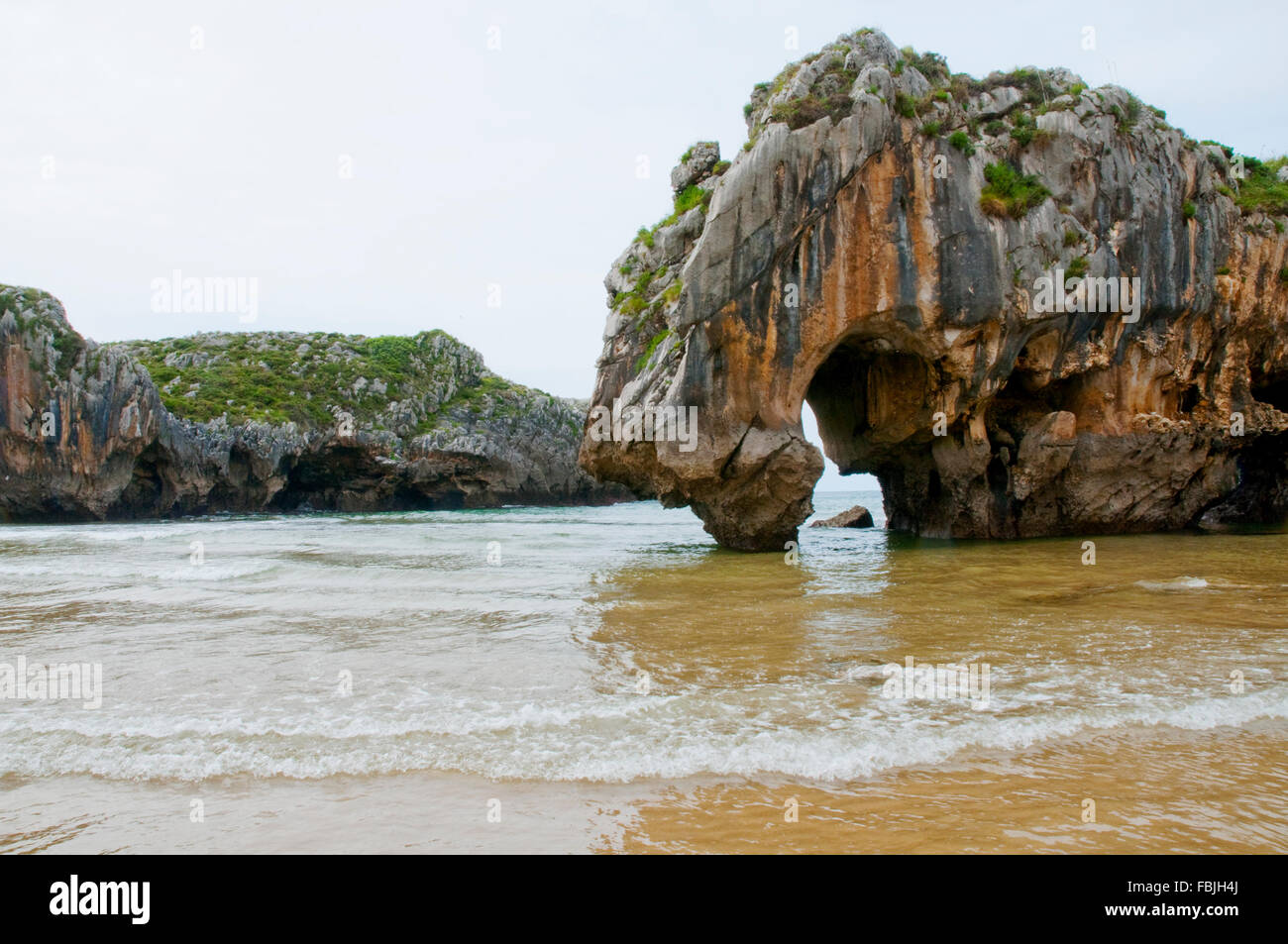 Cuevas del Mar beach. Nueva, Asturias, Spain. Stock Photo