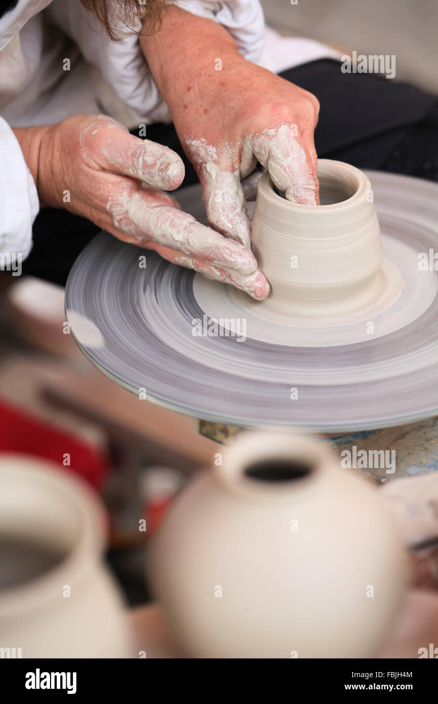 Potter working with clay Stock Photo Alamy