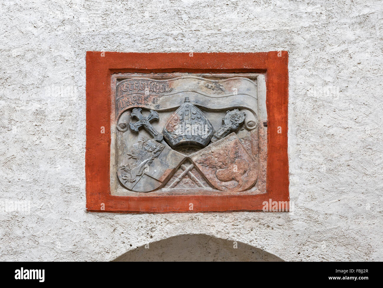 Ancient Coat of Arms closeup on the wall of fortress Hohensalzburg in Salzburg, Austria Stock