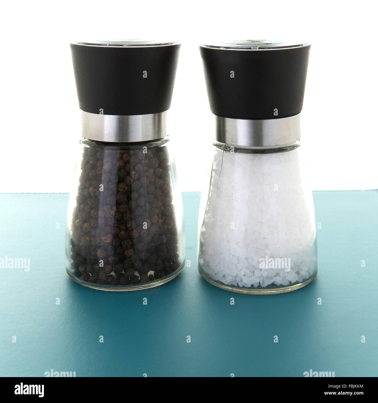 https://c8.alamy.com/comp/FBJKKM/glass-salt-and-pepper-grinders-FBJKKM.jpg