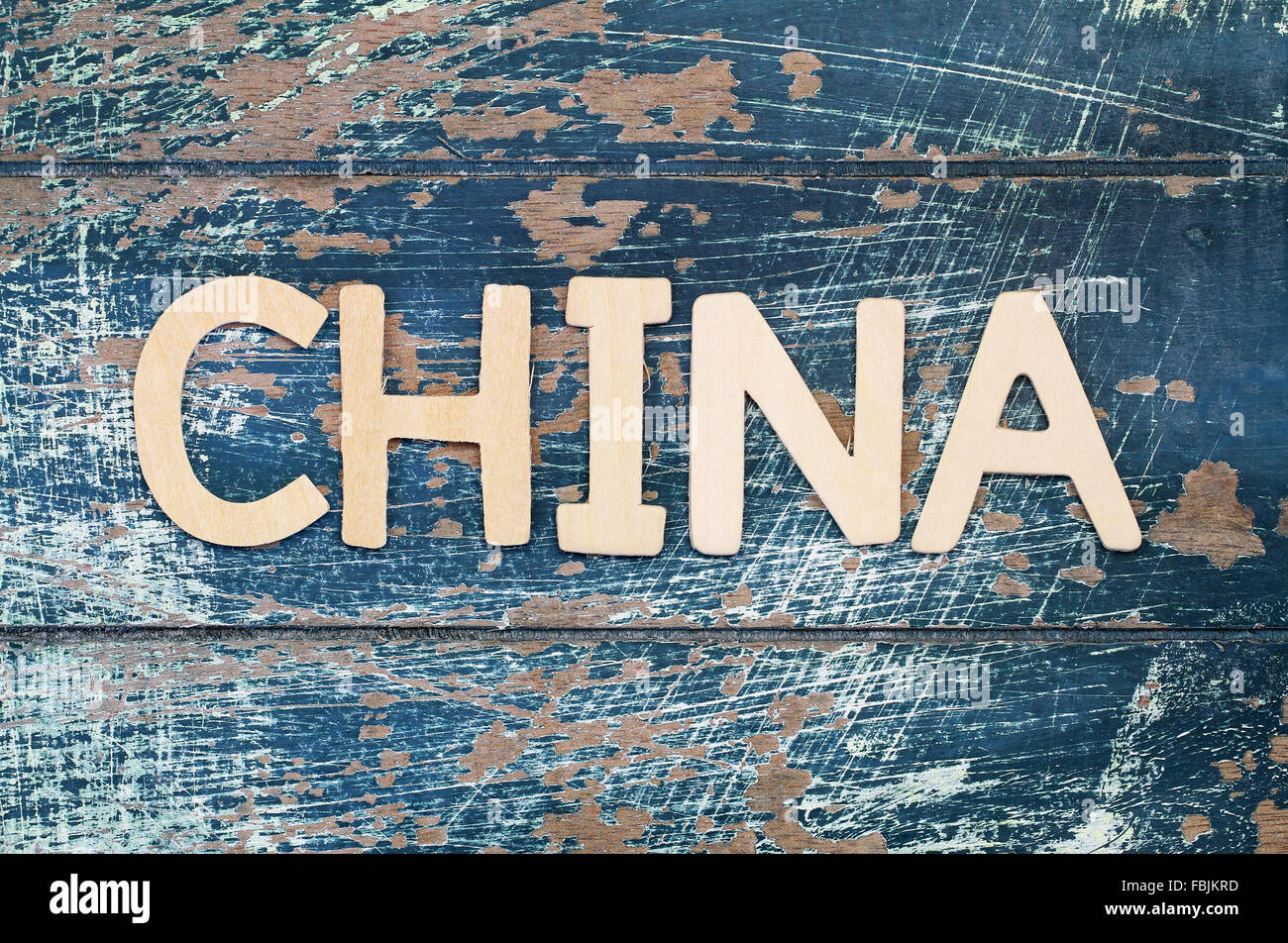 China written with wooden letters on rustic surface Stock Photo