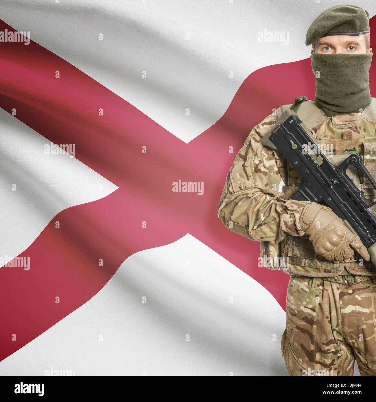 Soldier with machine gun and USA state flag on background series - Alabama Stock Photo