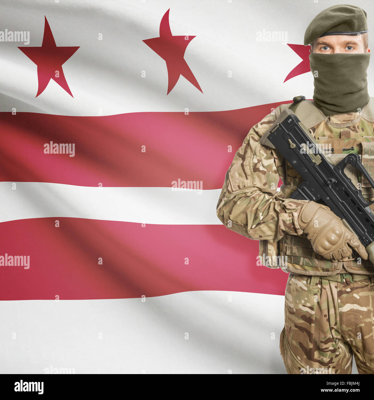 Soldier with machine gun and USA state flag on background series ...