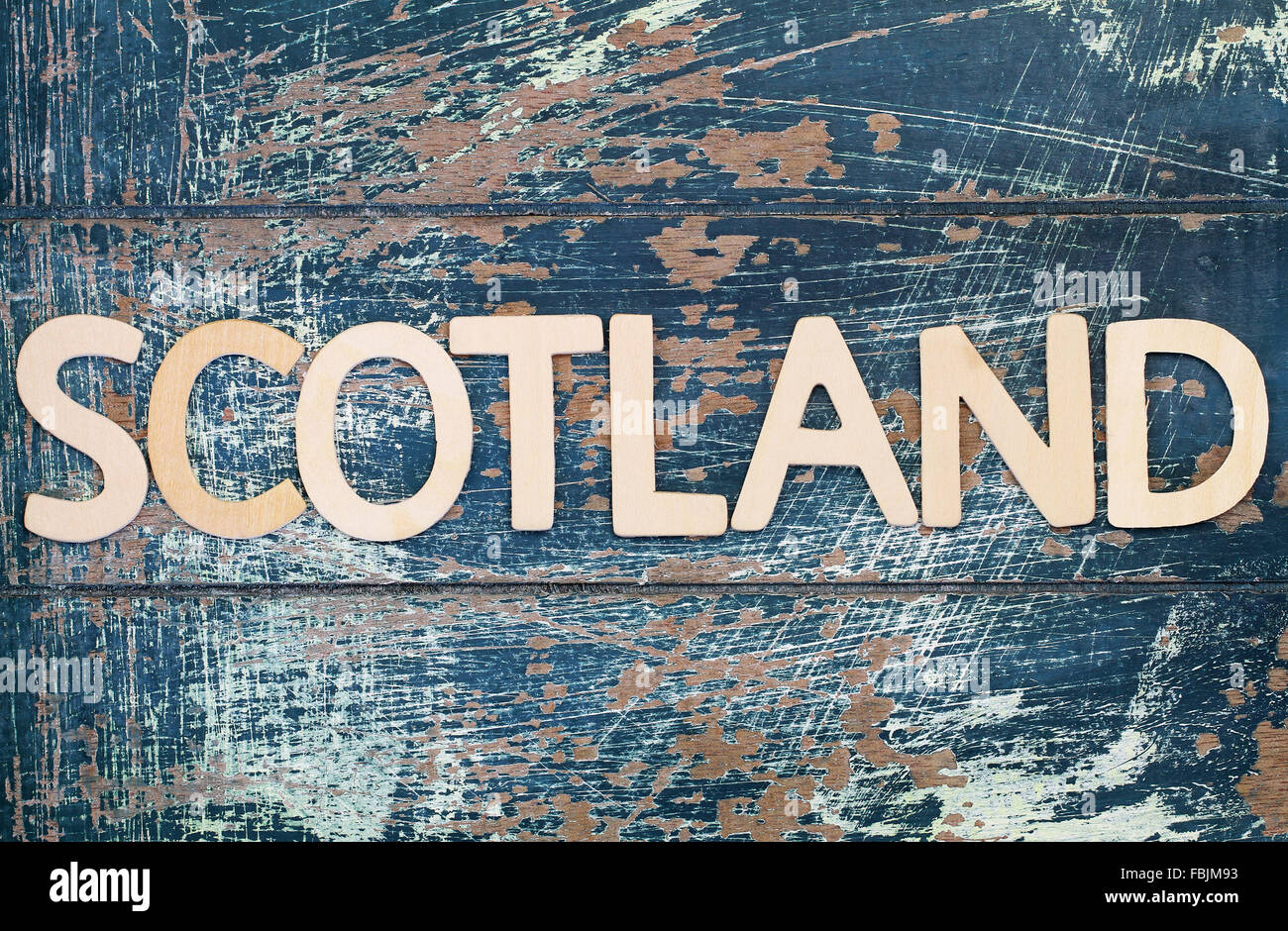 Scotland written with wooden letters on rustic surface Stock Photo