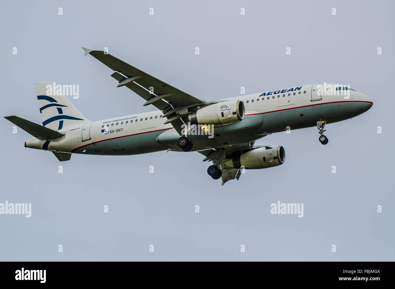 Aegean Airlines Airbus A320 -232 - SX-DVT coming in to land at London Heathrow Airport in overcast weather Stock Photo
