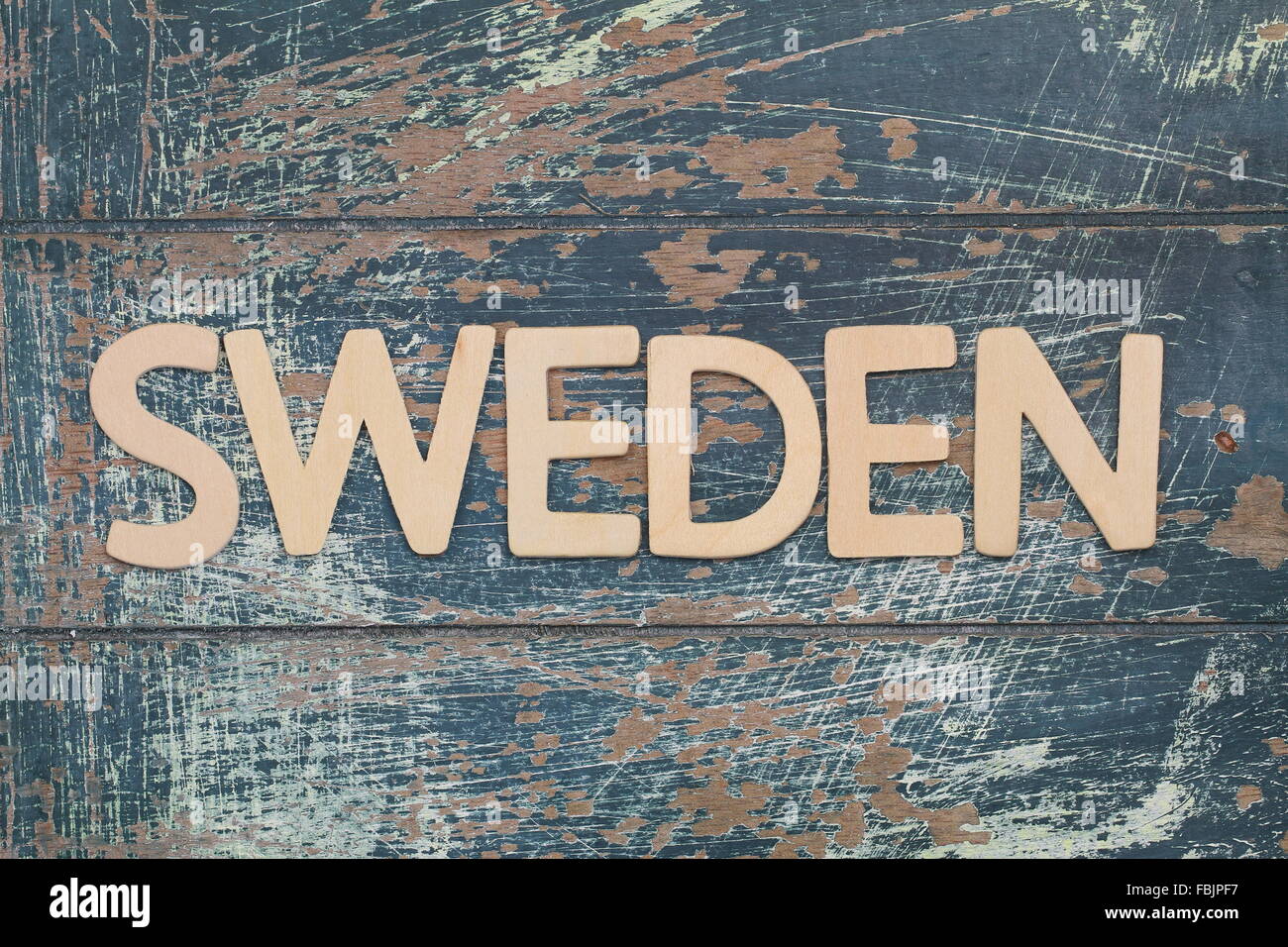 Sweden written with wooden letters on rustic surface Stock Photo