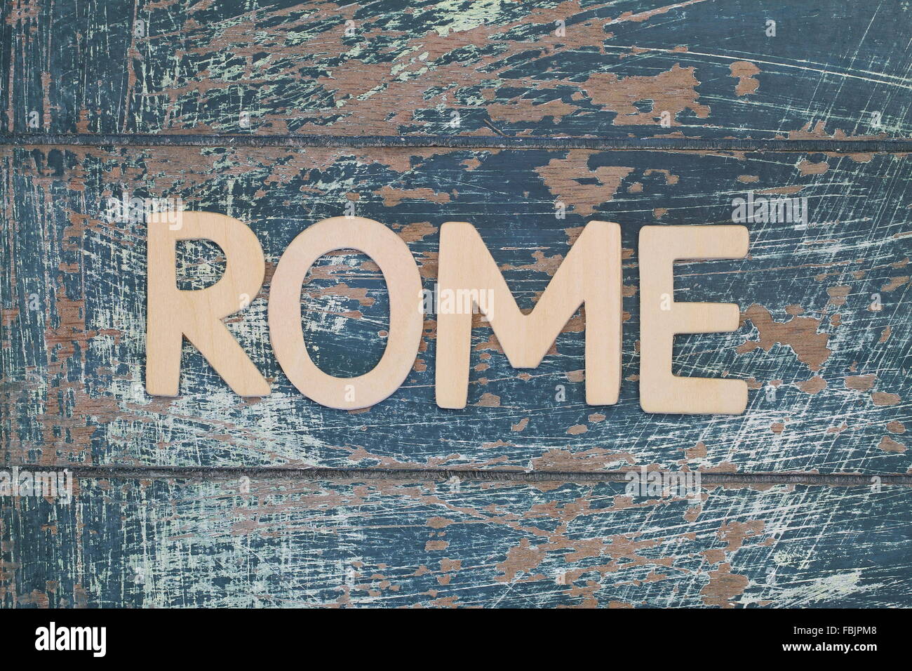 Rome written with wooden letters on rustic surface Stock Photo