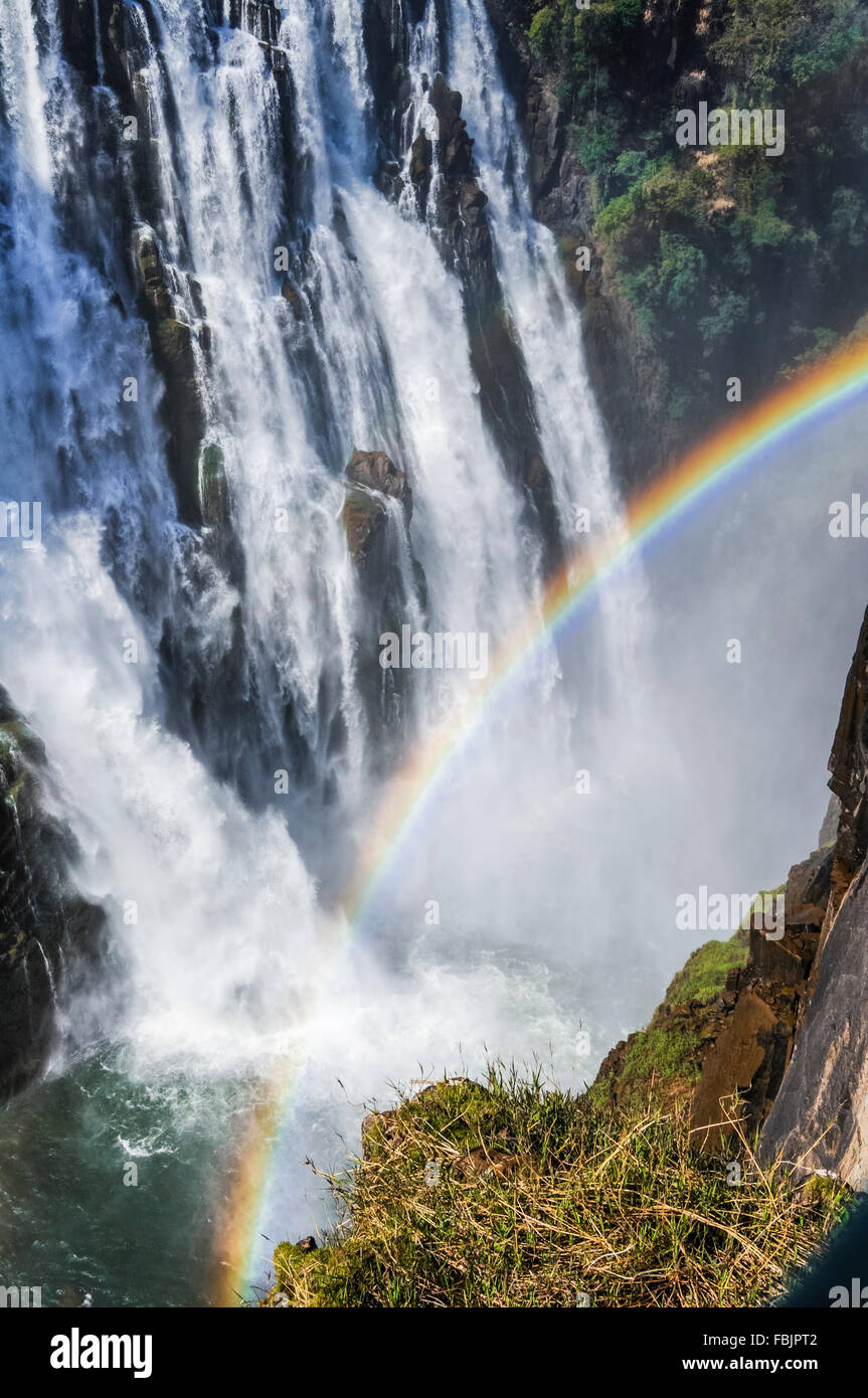 Cascading water of Victoria Falls filling the Zambezi river, Africa Stock Photo