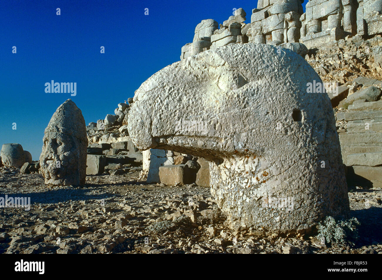 Stone Carved Eagle Head & Beak on the East Terrace of the Sacred Mountain, Tomb or Tumulus, Nemrut Dagh, Nemrut Dagi, Mount Nemrut or Nemrud, Kahta, near Adiyaman, Turkey. Stock Photo