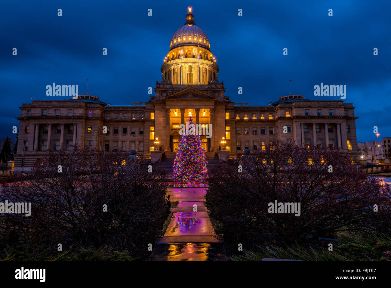 Christmas tree on the steps of the Idaho state capital at night Stock Photo