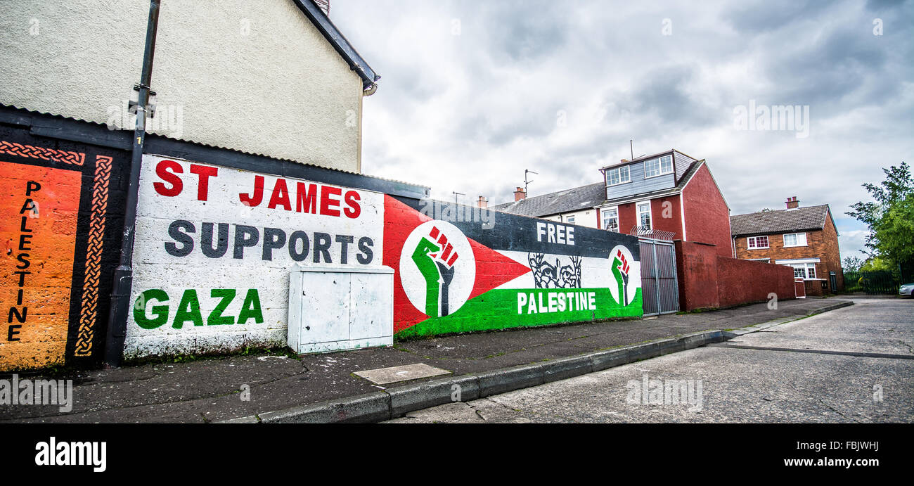 St James area of West Belfast supports Gaza against Israel with Free Palestine slogan mural. Stock Photo