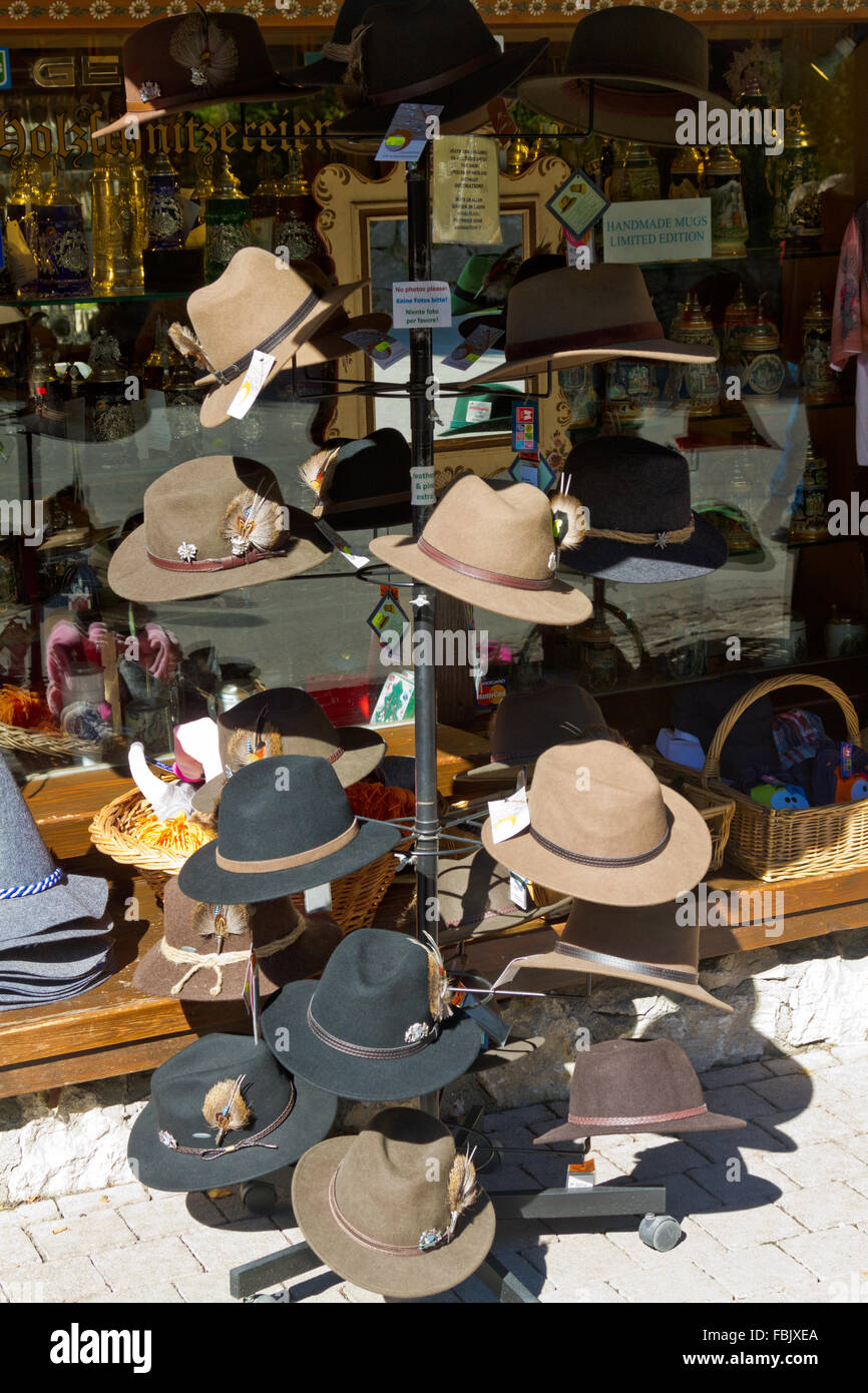 Tyrolean hats displayed on a rack outside a shop in Hohenschwangau, Germany. Stock Photo