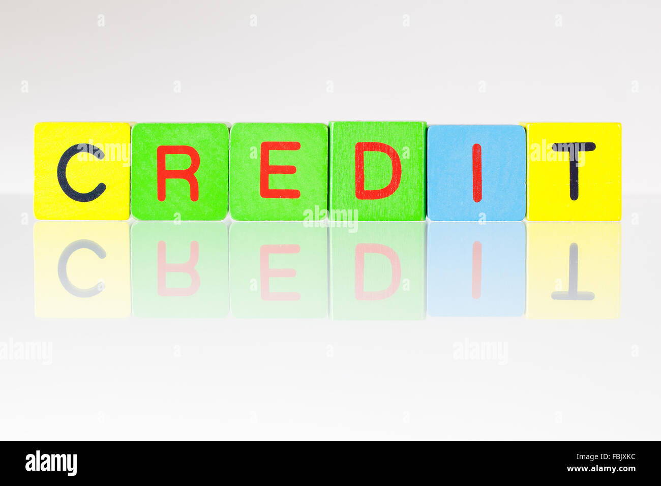 Credit - an inscription from children's wooden blocks Stock Photo
