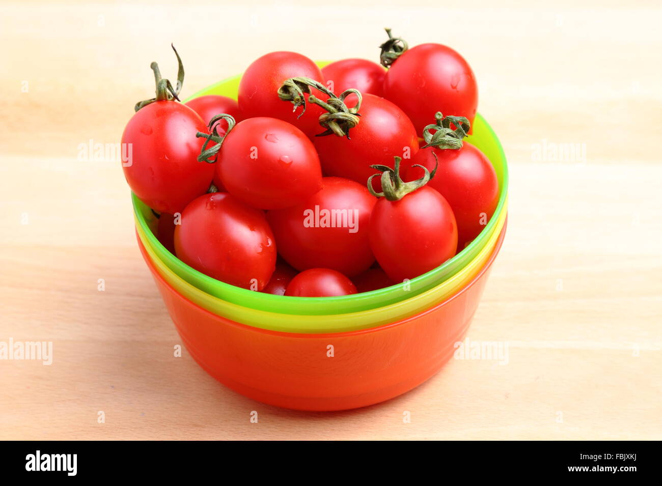 Plate with cherry tomatoes Stock Photo