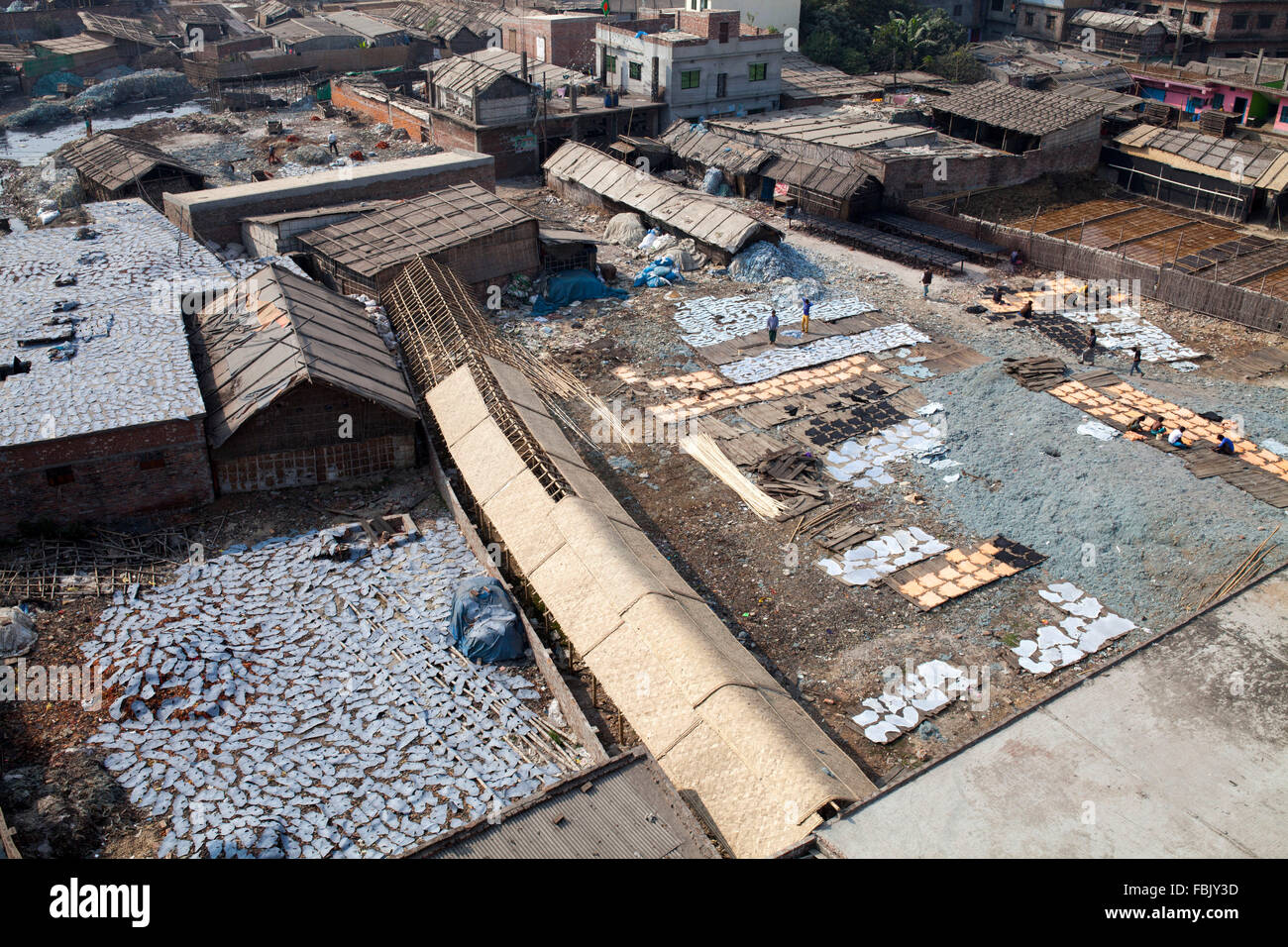 DHAKA, BANGLADESH 11th January 2016: Areal shot of Hazaribagh Tannery in Dhaka on January 11, 2016.  Industries Minister Amir Hossain Amu has ordered tannery owners to move their establishments within 72 hours from Hazaribagh to the Leather Industrial City at Savar on the outskirts of Dhaka.  Dhaka's Hazaribagh area, widely known for its tannery industry, has been listed as one of the top 10 polluted places on earth with 270 registered tanneries in Bangladesh, and around 90-95 percent are located at Hazaribagh employing 8,000 to 12,000 people. Stock Photo