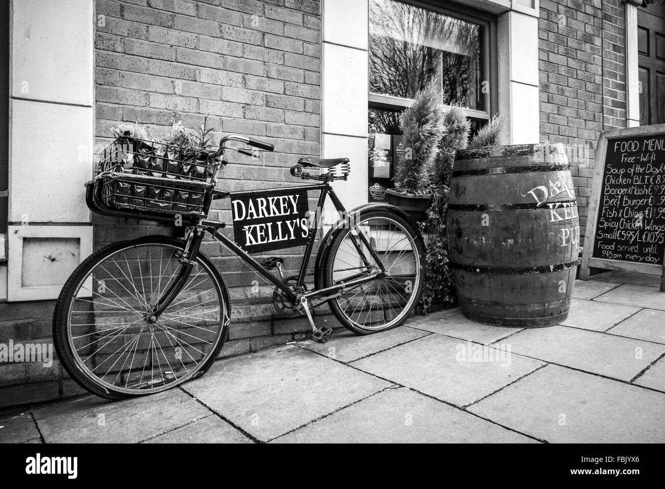 An old traditional Irish bicycle stands outside Darkey Kelly's in Dublin City Centre. Stock Photo