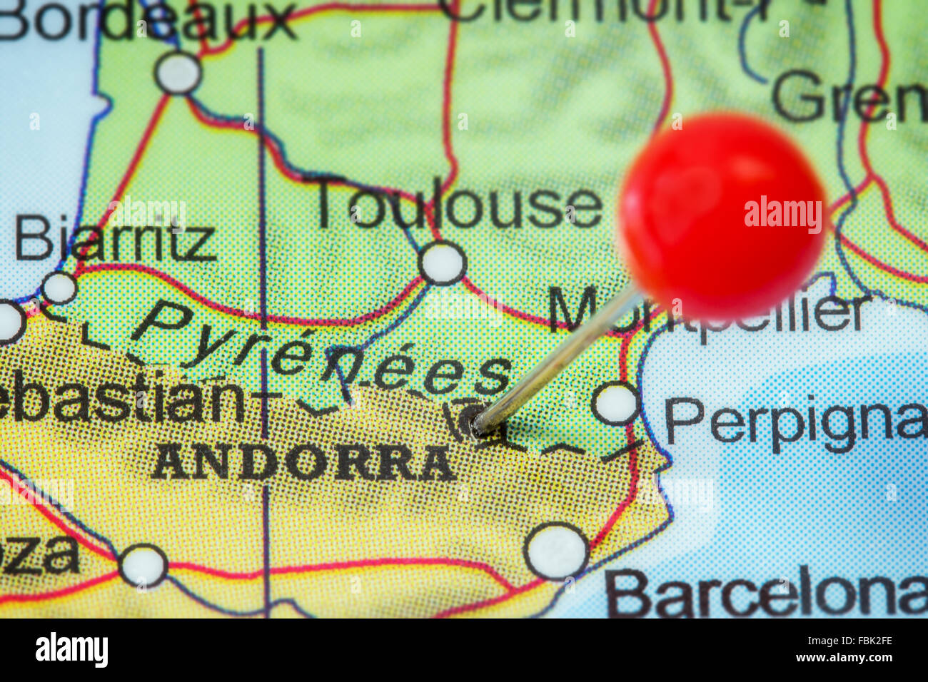 Close-up of a red pushpin in a map of Andorra. Stock Photo